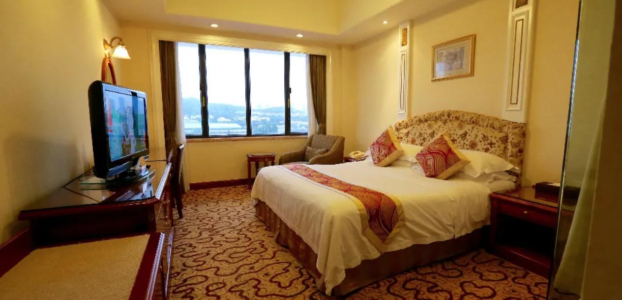 Huiquan Dynasty Hotel Циндао Екстериор снимка