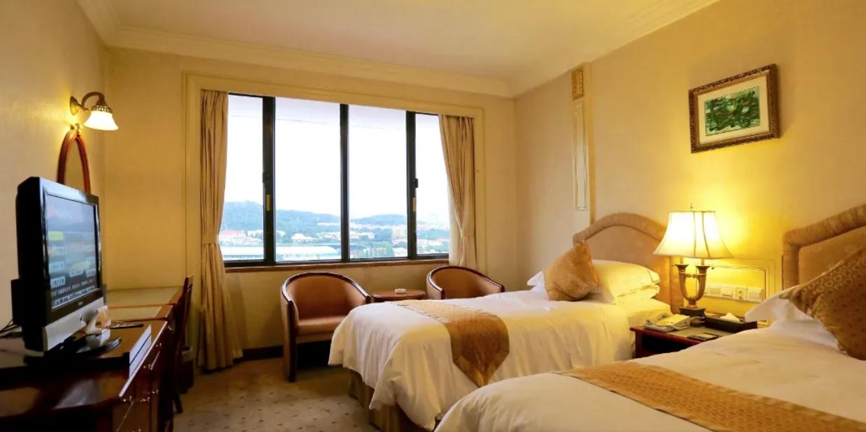 Huiquan Dynasty Hotel Циндао Екстериор снимка