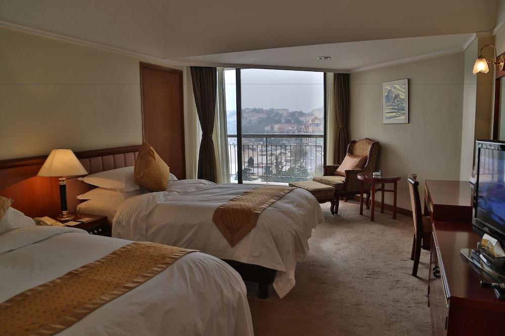 Huiquan Dynasty Hotel Циндао Екстериор снимка