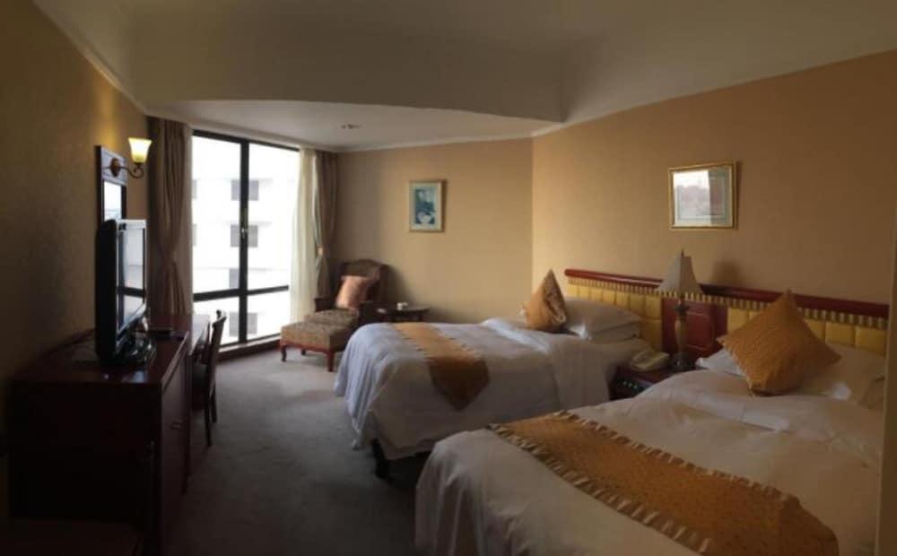 Huiquan Dynasty Hotel Циндао Екстериор снимка