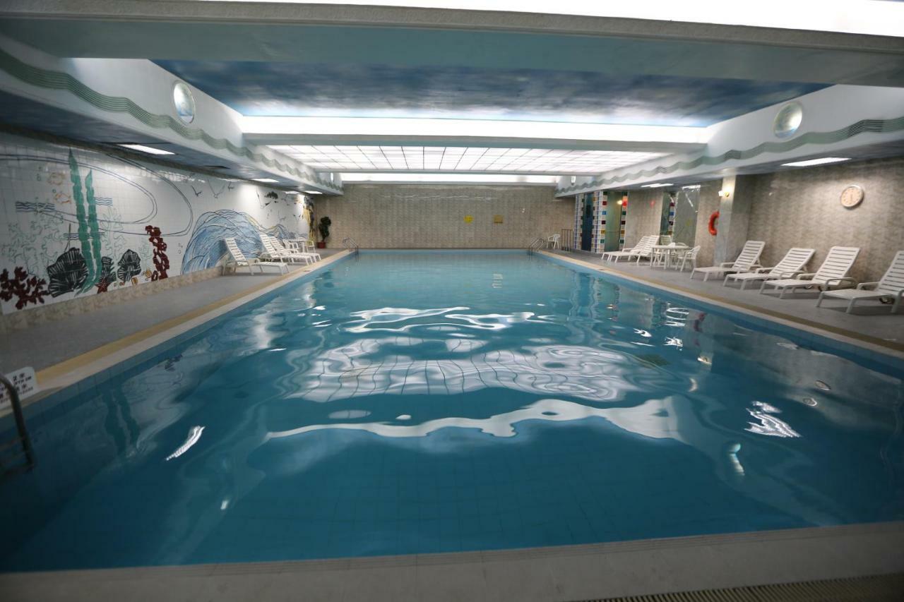 Huiquan Dynasty Hotel Циндао Екстериор снимка